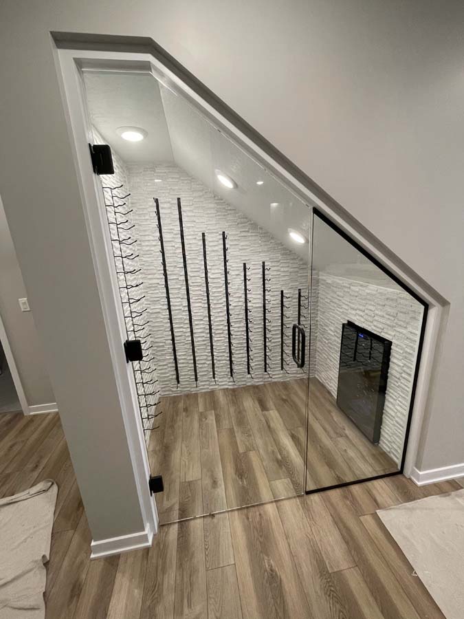 Glass Door to Wine Room Under Stairs