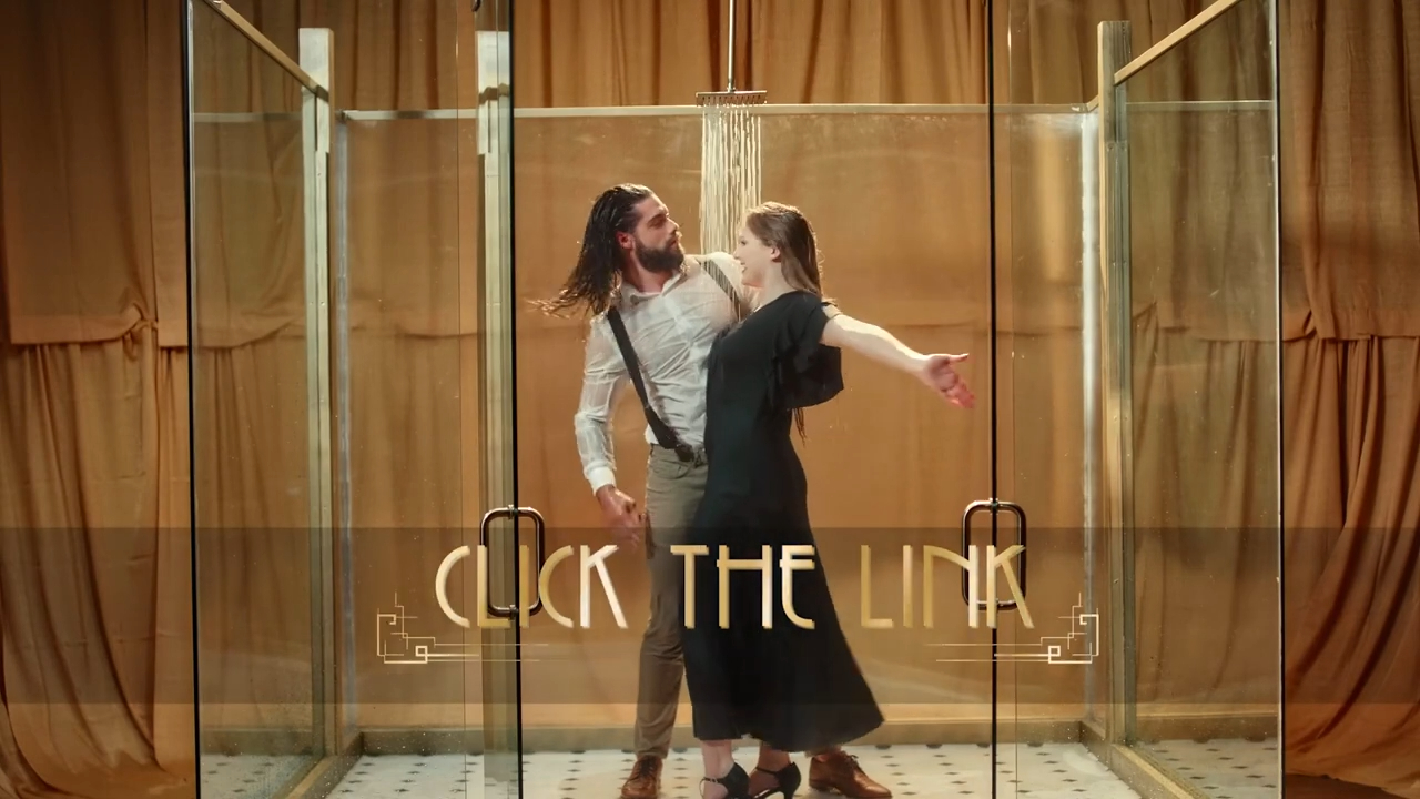 man and woman dancing in shower